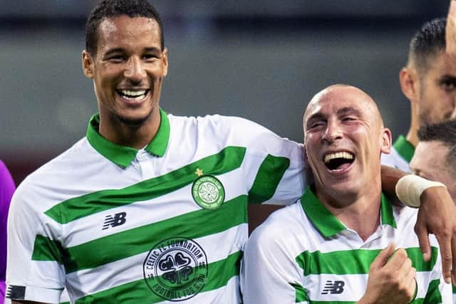 STOCKHOLM, SWEDEN - AUGUST 29: Celtic's Scott Brown and Christopher Jullien are pictured celebrating after the UEFA Europa League play-off match between AIK and Celtic on August 29, 2019, at the Friends Arena, Stockholm (Photo by Craig Williamson / SNS Group)