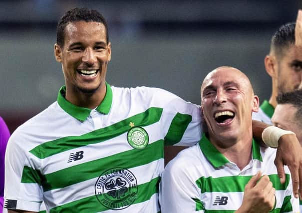 STOCKHOLM, SWEDEN - AUGUST 29: Celtic's Scott Brown and Christopher Jullien are pictured celebrating after the UEFA Europa League play-off match between AIK and Celtic on August 29, 2019, at the Friends Arena, Stockholm (Photo by Craig Williamson / SNS Group)