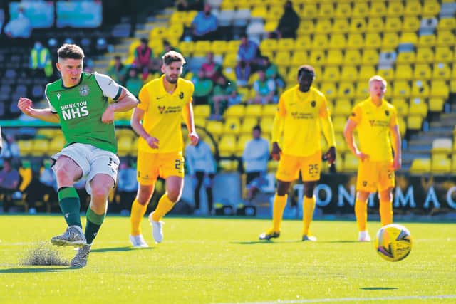 Kevin Nisbet completes his hat-trick from the penalty spot. Picture: Ross MacDonald / SNS