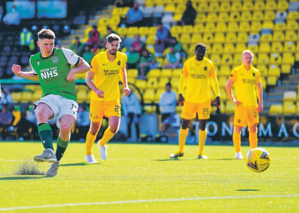 Kevin Nisbet completes his hat-trick from the penalty spot. Picture: Ross MacDonald / SNS