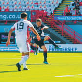 Billy Mckay scores for Ross County against Hamilton. Picture: Alan Harvey / SNS