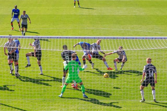 Alfredo Morelos plants a header into the net to give Rangers a two-goal cushion at Ibrox. Picture: Willie Vass/NMC Pool/PA