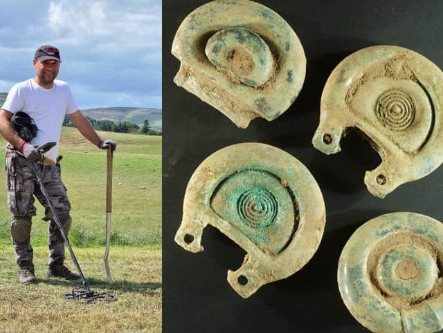 Mariusz Stepien found the hoard including  a horse harness and sword, decorated straps, buckles, rings, ornaments and chariot wheel axle caps