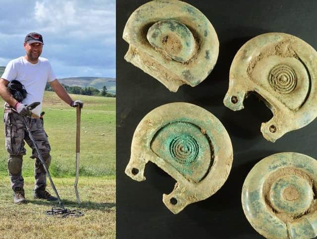 Mariusz Stepien found the hoard including a horse harness and sword, decorated straps, buckles, rings, ornaments and chariot wheel axle caps