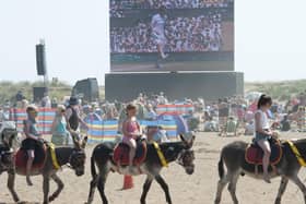 A united kingdom? Andy Murray fans relax on Skegness beach watching him take part in the men's Wimbledon final in 2013 (Picture: SWNS)