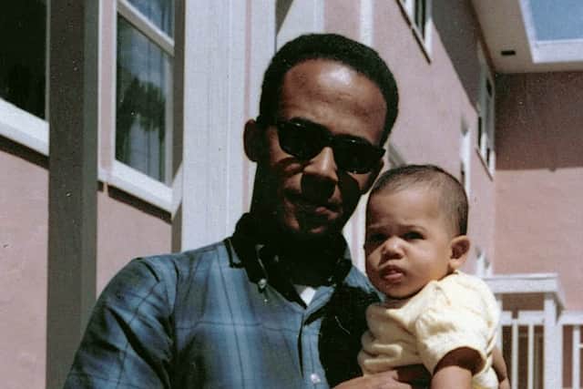 In this April 1965 photo provided by the Kamala Harris campaign, Donald Harris holds his daughter Kamala. Picture: Kamala Harris campaign via AP