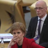 Scottish First Minister Nicola Sturgeon with education secretary John Swinney. Picture: Fraser Bremner - Pool/Getty Images
