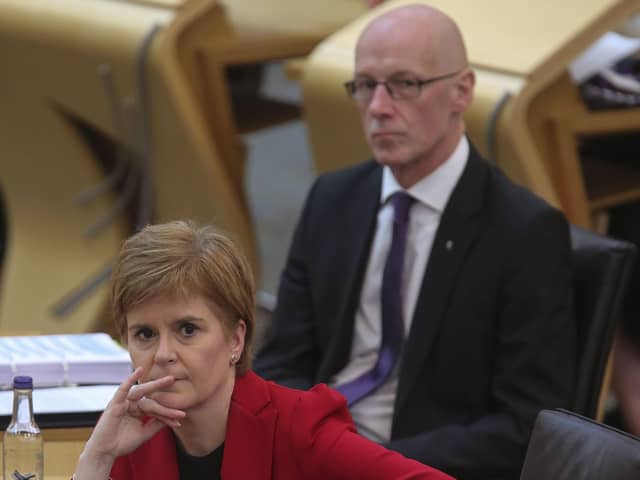Scottish First Minister Nicola Sturgeon with education secretary John Swinney. Picture: Fraser Bremner - Pool/Getty Images