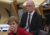Scottish First Minister Nicola Sturgeon with education secretary John Swinney. Picture: Fraser Bremner - Pool/Getty Images