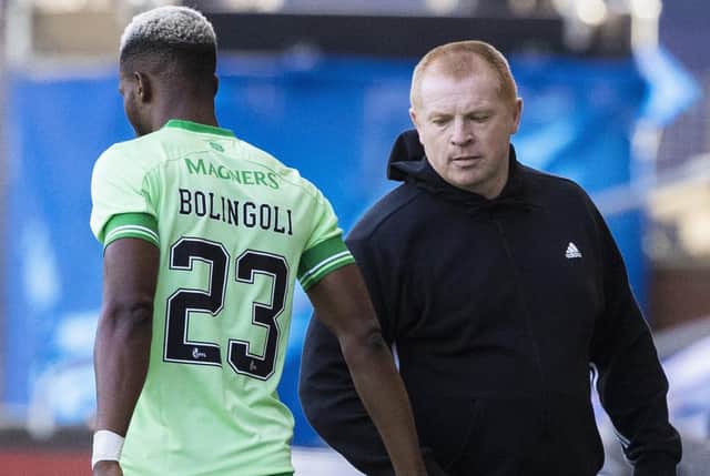 Celtic defender Boli Bolingoli, left, breached coronavirus rules by playing against Kilmarnock on Sunday despite returning from Spain without quarantining. Picture: Craig Williamson/SNS