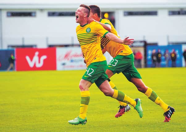 Callum McGregor celebrates after scoring his first goal for Celtic on his debut in a Champions League qualifier against KR Reykjavik in 2014. Photograph: Sammy Turner/SNS