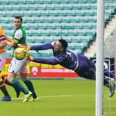 Ofir Marciano’s made a great save from Callum Lang to keep Hibs level. Photograph: Ross MacDonald/SNS