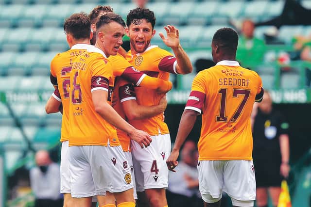 Motherwell players celebrate but their goal was disallowed for an offside call. Picture: Ross MacDonald/SNS Group
