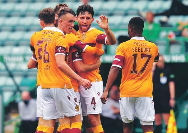 Motherwell players celebrate but their goal was disallowed for an offside call. Picture: Ross MacDonald/SNS Group