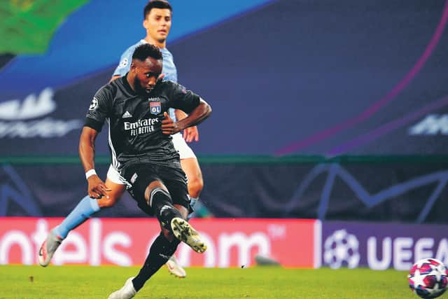 Lyon's Moussa Dembele scores his team's second goal during the 3-1 win over Manchester City. Picture: Franck Fife/AP