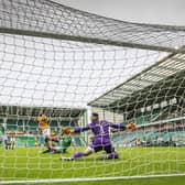 Jordan White’s shot deflects off Paul Hanlon before finding the Hibs’ net, but Motherwell were denied the goal which was ruled out due to Sherwin Seedorf being offside. Picture: Scottish Sun/Pool/via SNS.