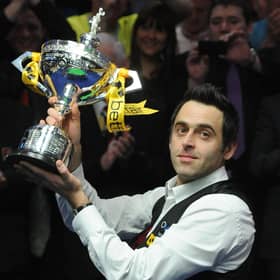 Ronnie O'Sullivan with the world championship trophy. Picture: BBC
