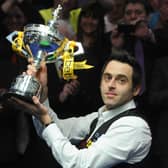 Ronnie O'Sullivan with the world championship trophy. Picture: BBC