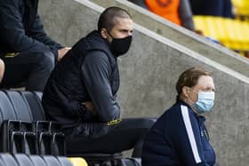 QPR-bound Lyndon Dykes watches on from the stands during Livingston's match against Rangers at the Tony Macaroni Arena. Picture: Craig Williamson/NMC Pool/PA Wire.