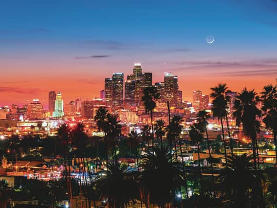 LA is a sprawling mass of a city, with relatively few skyscrapers which are almost exclusively located downtown