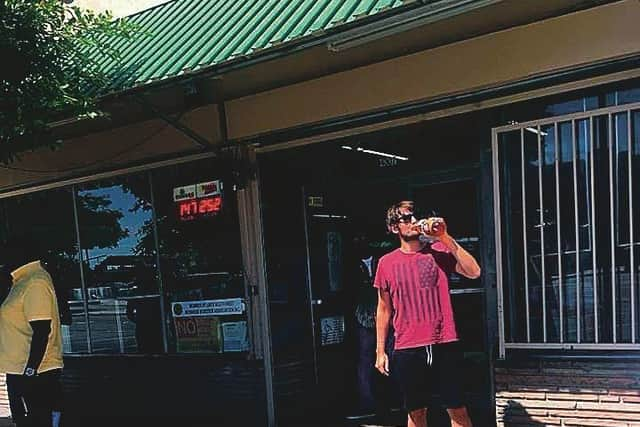 Craig Fowler enjoys a beer on his guided tour of South Central.