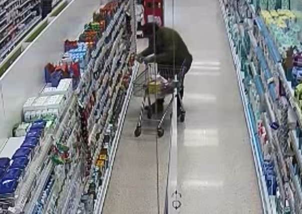 Screen grab issued by Hertfordshire Constabulary showing Nigel Wright in the Tesco store in Lockerbie