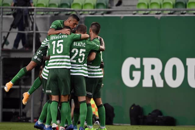 Ferencvaros players celebrate during the Champions League qualification first round win over Djurgarden in Budapest. Picture: MTI via AP