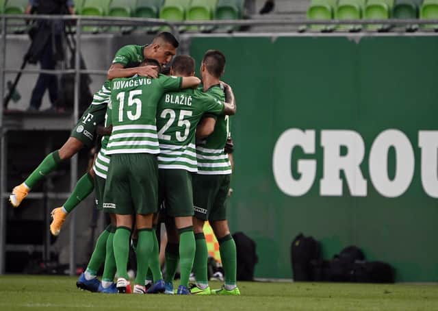 Ferencvaros players celebrate during the Champions League qualification first round win over Djurgarden in Budapest. Picture: MTI via AP