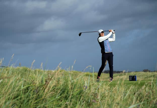 Catriona Matthew tees off at the third hole during the first round of the AIG Women's Open at a windswept Royal Troon. Picture: R&A via Getty Images