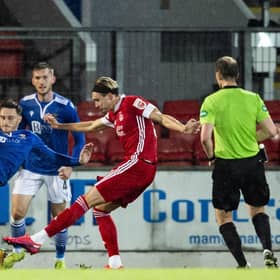Ryan Hedge had only just been introduced as a substitute  when he fired this shot into the St Johnstone net, with the aid of a deflection, to clinch a 1-0 victory for the Dons. Picture: SNS.