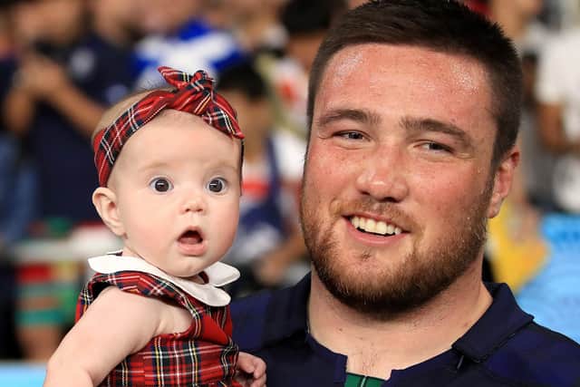 Zander Fagerson with his tartan mascot and daughter Iona at the Rugby World Cup in Japan. Picture: Adam Davy/PA