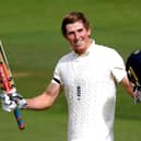 England batsman Zak Crawley raises his bat after passing three figures on his way to a score of 171 not out at stumps at the Ageas Bowl. Picture: Mike Hewitt/NMC Pool/PA Wire