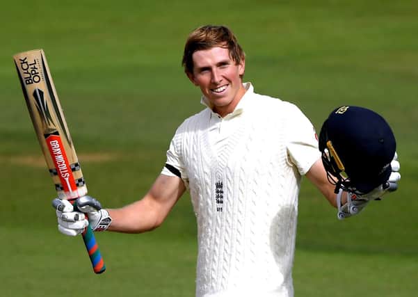 England batsman Zak Crawley raises his bat after passing three figures on his way to a score of 171 not out at stumps at the Ageas Bowl. Picture: Mike Hewitt/NMC Pool/PA Wire