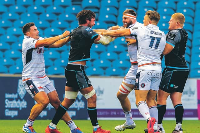 Edinburgh's Nick Haining, clashes with Glasgow Warriors' Ryan Wilson. Picture: Ross Parker / SNS