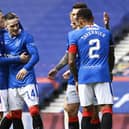 Rangers Ryan Kent celebrates with Steven Davis after scoring to make it 2-0 during  the Scottish Premiership match between Rangers  and Kilmarnock at Ibrox Stadium, on August 22, 2020, in Glasgow, Scotland. (Photo by Rob Casey / SNS Group)