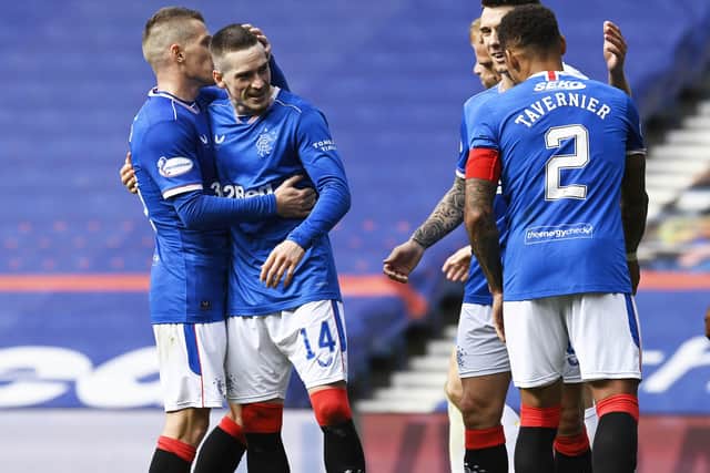 Rangers Ryan Kent celebrates with Steven Davis after scoring to make it 2-0 during the Scottish Premiership match between Rangers and Kilmarnock at Ibrox Stadium, on August 22, 2020, in Glasgow, Scotland. (Photo by Rob Casey / SNS Group)