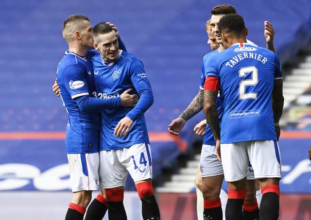 Rangers Ryan Kent celebrates with Steven Davis after scoring to make it 2-0 during the Scottish Premiership match between Rangers and Kilmarnock at Ibrox Stadium, on August 22, 2020, in Glasgow, Scotland. (Photo by Rob Casey / SNS Group)