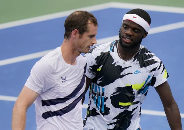 Andy Murray chats to Frances Tiafoe at the net after the Scot defeated the American at the Western & Southern Open. Picture: Frank Franklin II