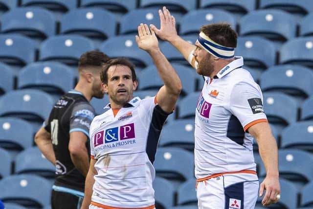 Edinburgh's Nic Groom, left, celebrates his second try against Glasgow Warriors at BT Murrayfield. Picture: Ross Parker/SNS Group