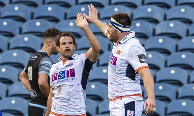 Edinburgh's Nic Groom, left, celebrates his second try against Glasgow Warriors at BT Murrayfield. Picture: Ross Parker/SNS Group