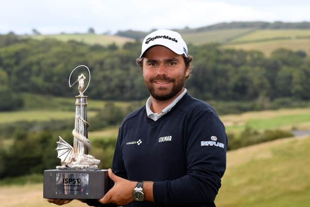 Romain Langasque with the trophy after his Wales Open win. Picture: Ross Kinnaird/Getty