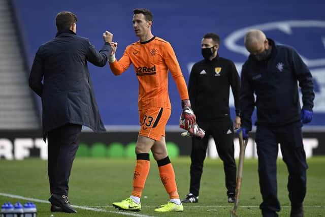 Steven Gerrard congratulates Jon McLaughlin after his clean sheet against Kilmarnock at Ibrox on Saturday. Picture: Rob Casey/SNS Group