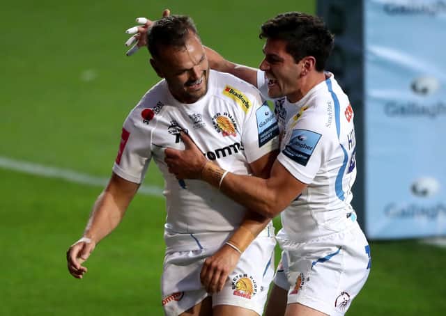 Sam Hidalgo-Clyne, right, celebrates with Exeter team-mate Phil Dollman. Picture: Nick Potts/PA Wire
