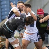 Edinburgh's Nick Haining gets up close and personal with Glasgow Warriors' Ryan Wilson during Saturday's match at BT Murrayfield. Picture: Ross Parker / SNS