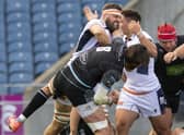 Edinburgh's Nick Haining gets up close and personal with Glasgow Warriors' Ryan Wilson during Saturday's match at BT Murrayfield. Picture: Ross Parker / SNS