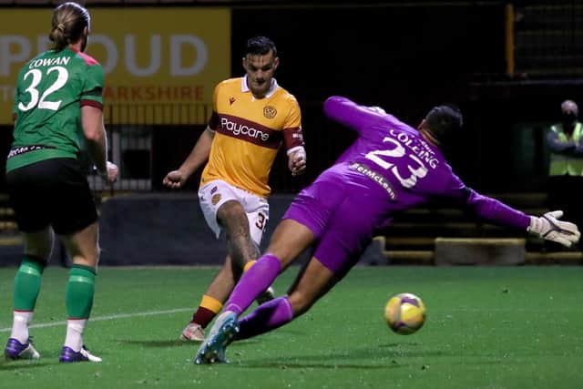 Motherwell's Tony Watt scores his side's fourth goal. Picture: Andrew Milligan/PA Wire