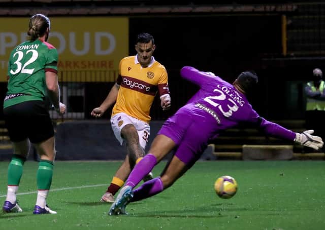 Motherwell's Tony Watt scores his side's fourth goal. Picture: Andrew Milligan/PA Wire