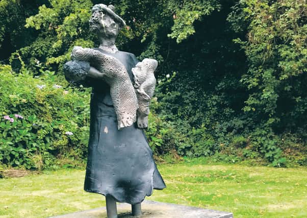 A monument to May Donoghue, who sued the maker of a bottle of ginger beer she bought at a cafe in 1928