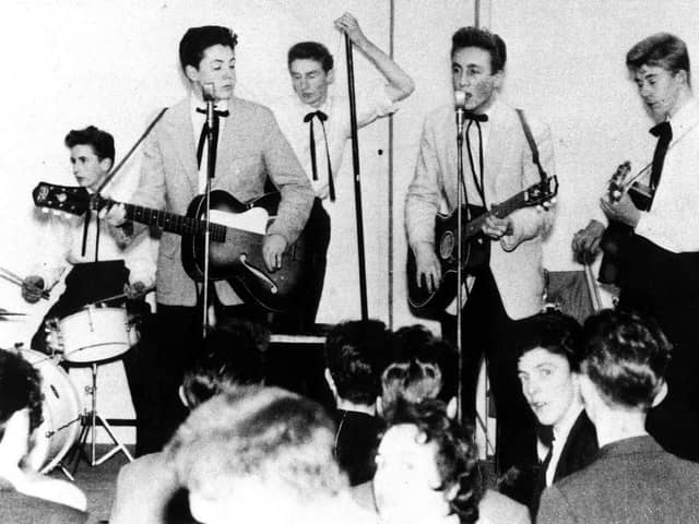 A 15-year-old Paul McCartney, left, with John Lennon, centre, makes his debut with the Quarrymen in 1957. Just a year later, he wrote When I’m Sixty-Four (Picture: PA)