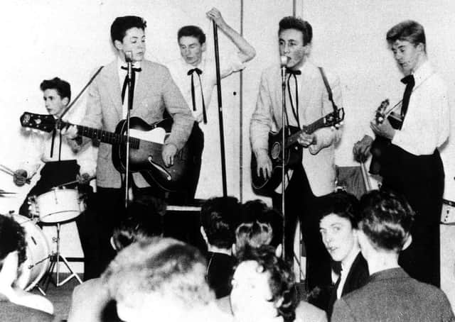 A 15-year-old Paul McCartney, left, with John Lennon, centre, makes his debut with the Quarrymen in 1957. Just a year later, he wrote When I’m Sixty-Four (Picture: PA)